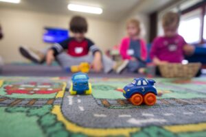 Kids playing with cars