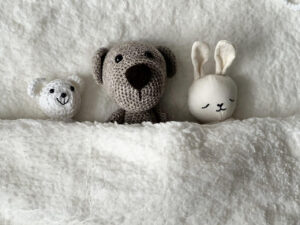 Plush toys under the blanket