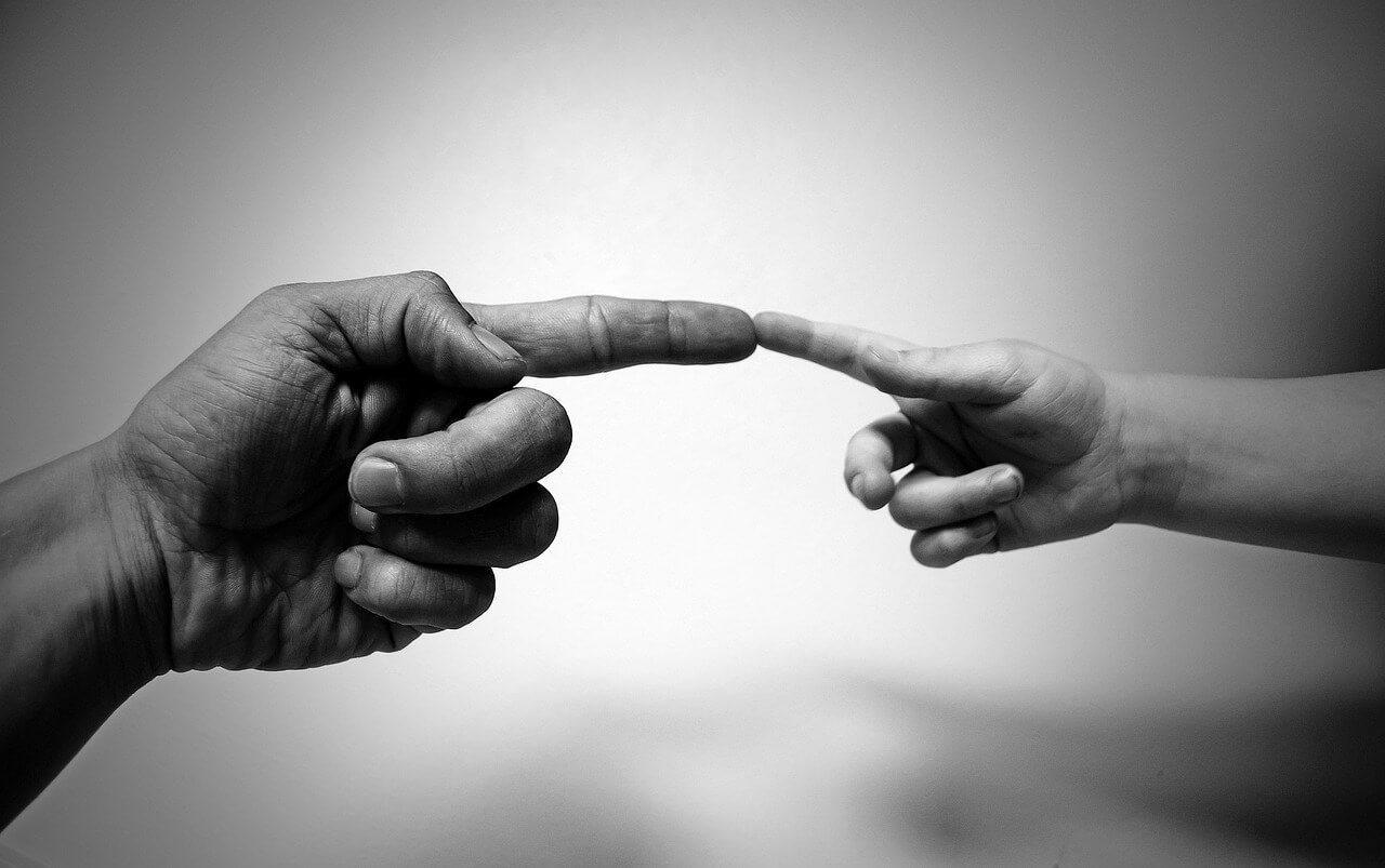 Finger contact between a child and an adult